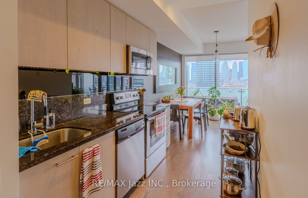 Photo of 70 Distillery Lane #1409, Toronto, ON M5A 0E3 (MLS # C13831738)