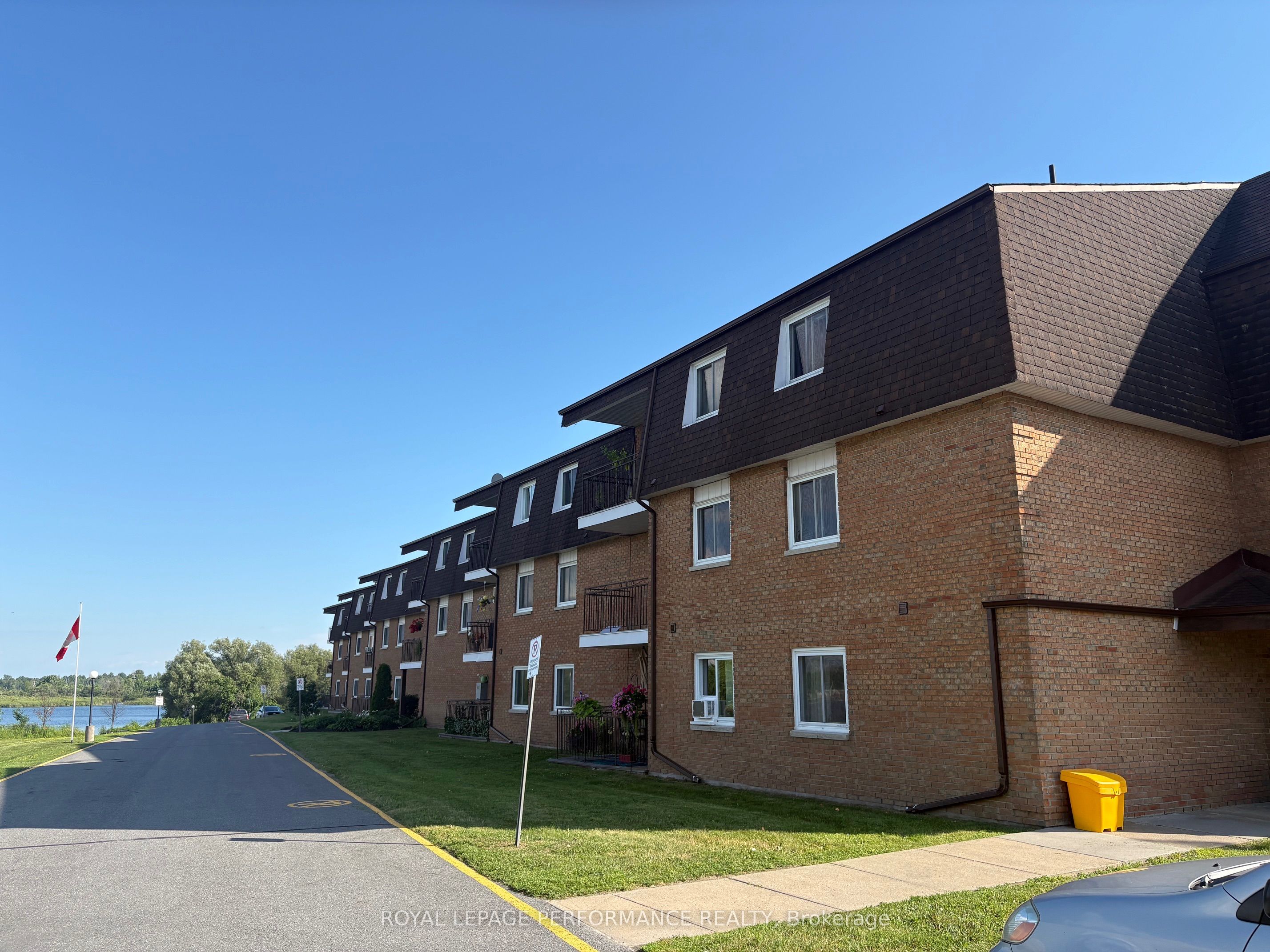Brick condominium bordering Mill Pond