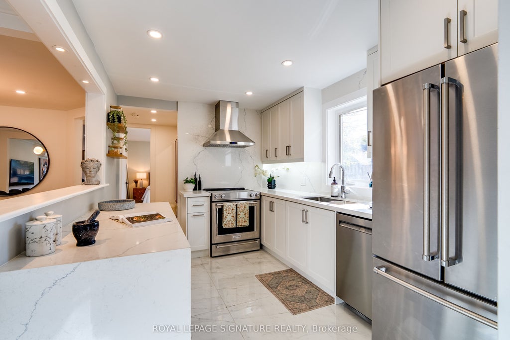 Photo of 31 Davies Crescent, Toronto, ON M4J 2X7 (MLS # E14099680)