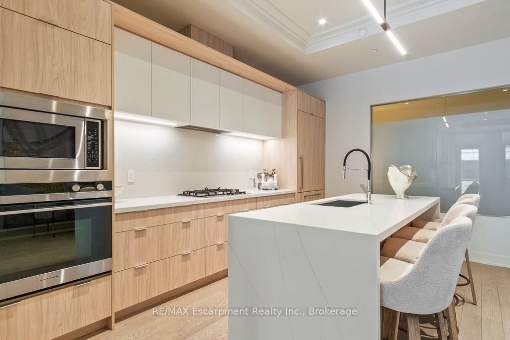 Photo of 123 Maurice Drive #105, Oakville, ON L6K 2W6 (MLS # W12883006)