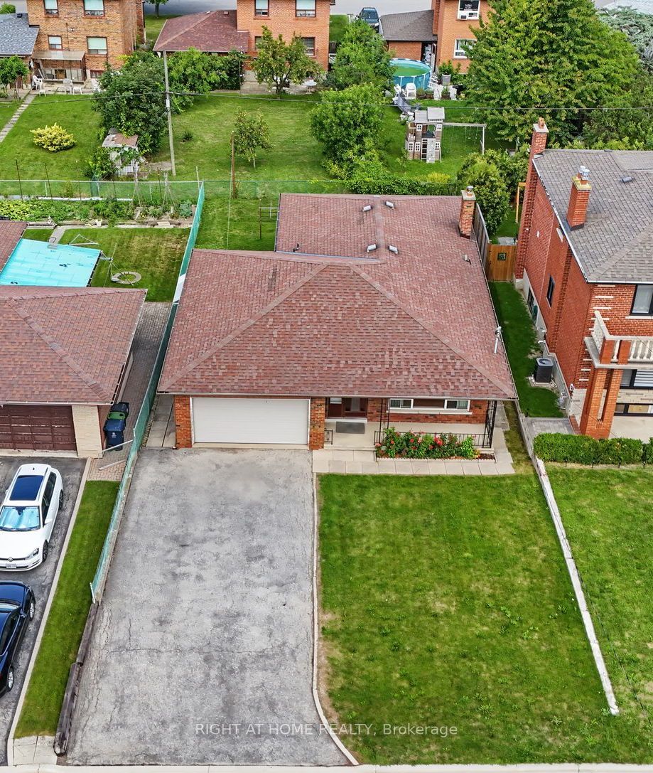 Photo of 84 Raven Road, Toronto, ON M6L 2A7 (MLS # W13699802)