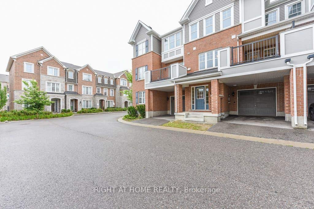Photo of 1222 Rose Way #63, Milton, ON L9E 1P2 (MLS # W13712416)