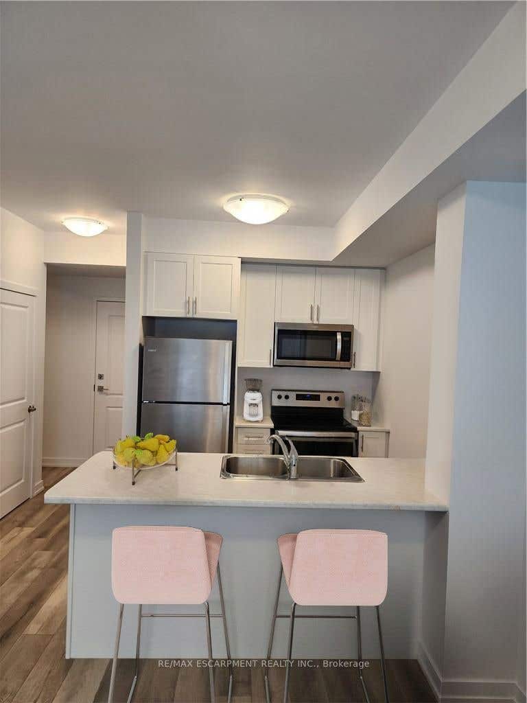 Photo of 5055 Greenlane Road #124, Lincoln, ON L0R 1B3 (MLS # X13428814)