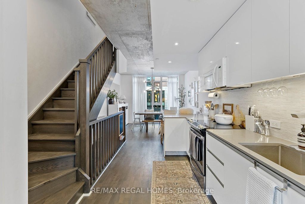 Photo of 1238 Dundas Street E #TH110, Toronto, ON M4M 0C6 (MLS # E12758572)