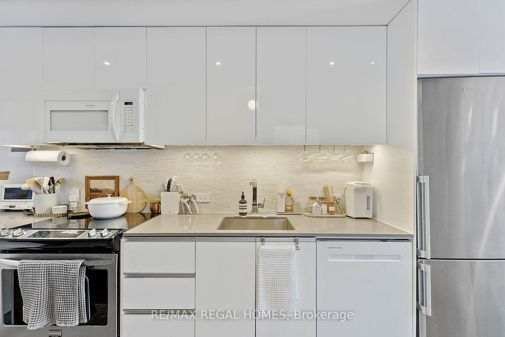 Photo of 1238 Dundas Street E #TH110, Toronto, ON M4M 0C6 (MLS # E12758572)