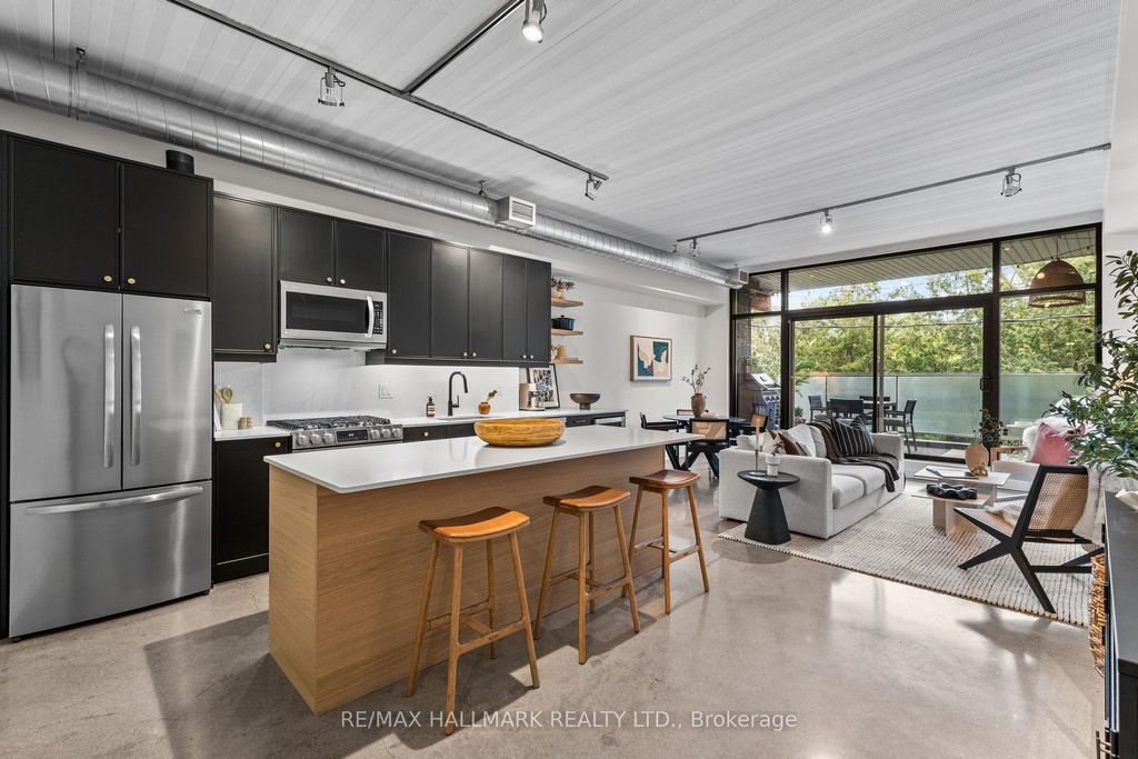 Photo of 747 Queen Street E #202, Toronto, ON M4M 1H3 (MLS # E13476294)