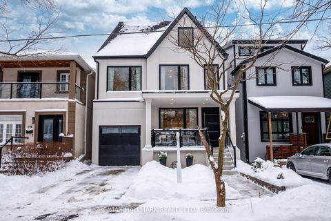 68 Rhodes Avenue Toronto ON M4L 2Z9