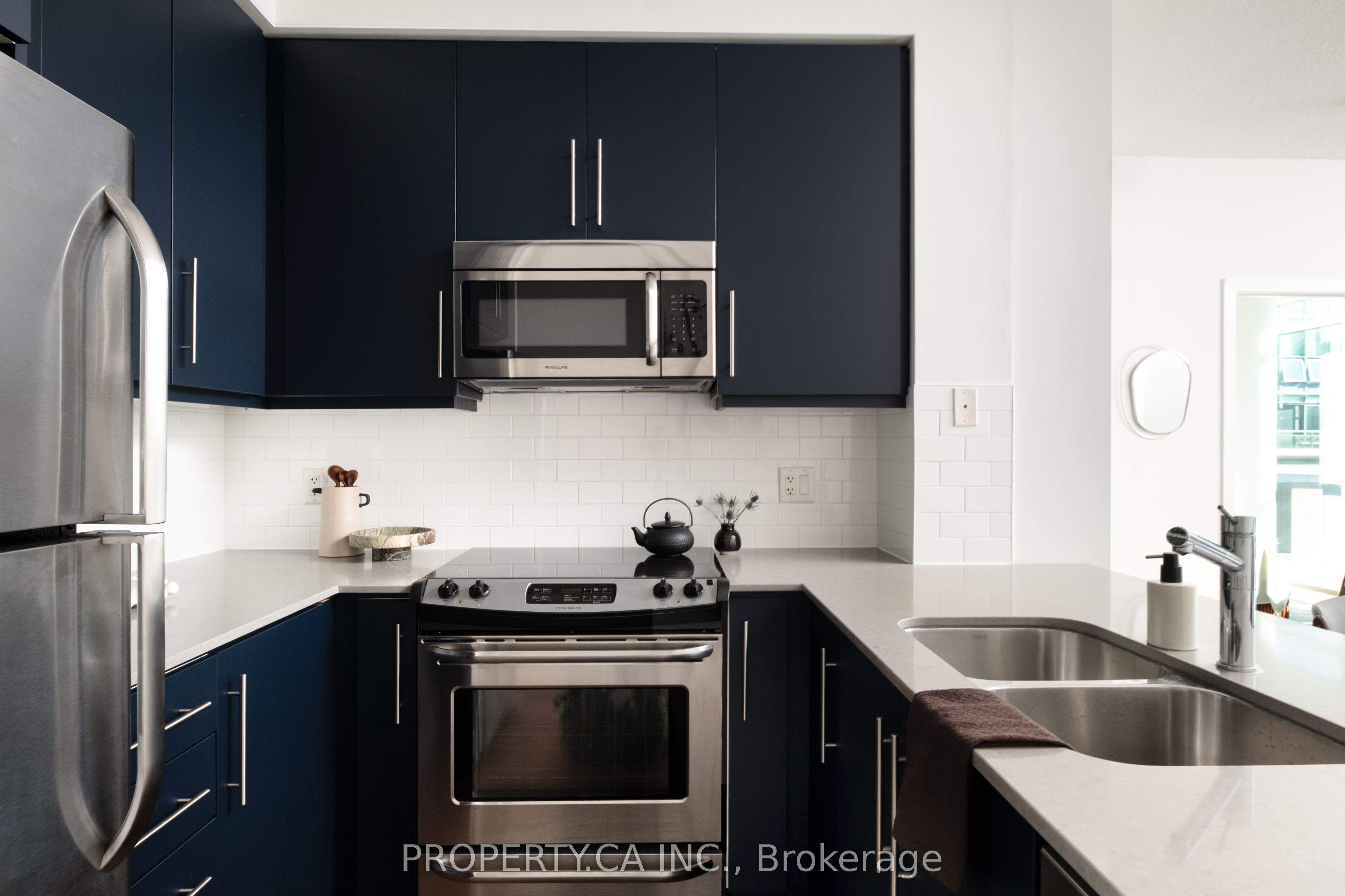 1171 Queen Street W 704