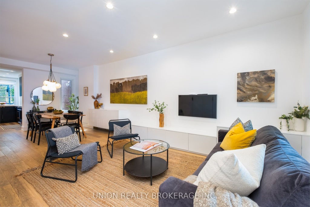 Photo of 17 Ashland Avenue, Toronto, ON M4L 1J9 (MLS # E13840936)