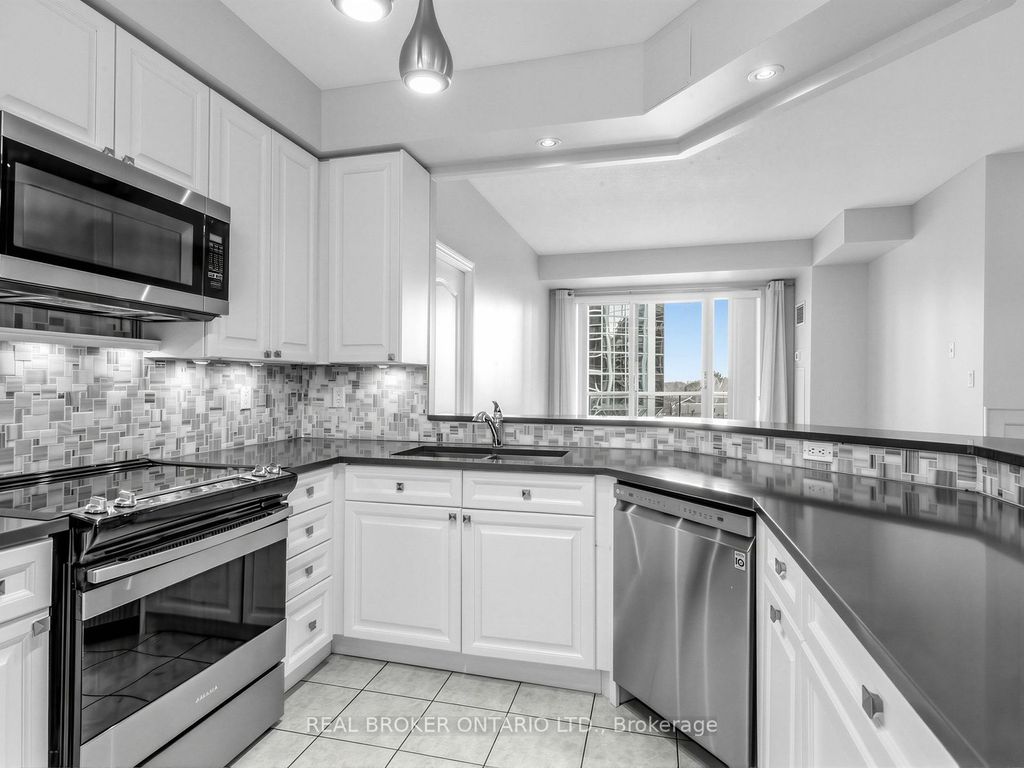 Photo of 2 Aberfoyle Crescent #502, Toronto, ON M8X 2Z8 (MLS # W13000258)