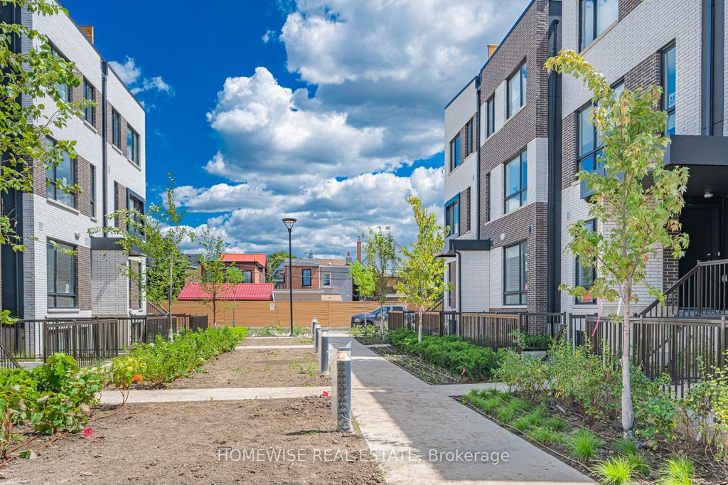 Photo of 20 Ed Clark Gardens #TH8, Toronto, ON M6N 0B5 (MLS # W12950676)