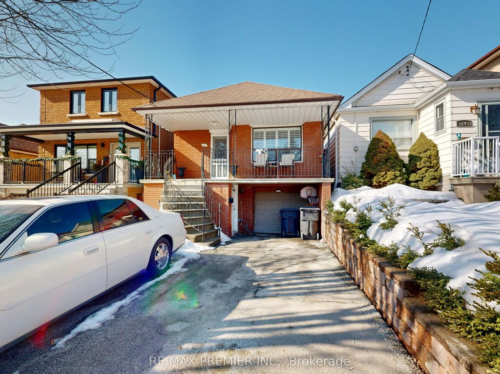 Photo of 52 Montcalm Avenue, Toronto, ON M6E 4N7 (MLS # W13077014)