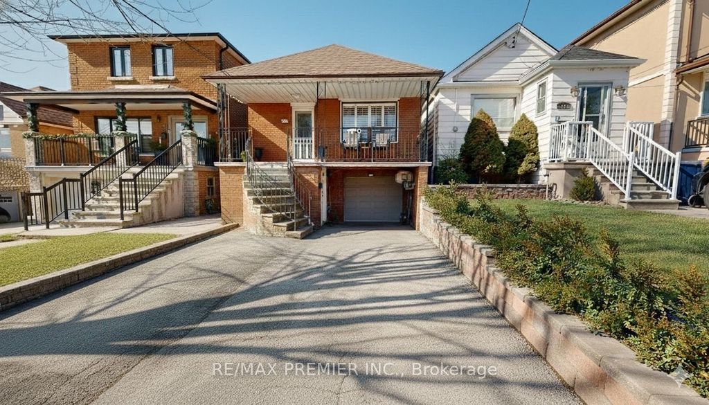 Photo of 52 Montcalm Avenue, Toronto, ON M6E 4N7 (MLS # W13077014)