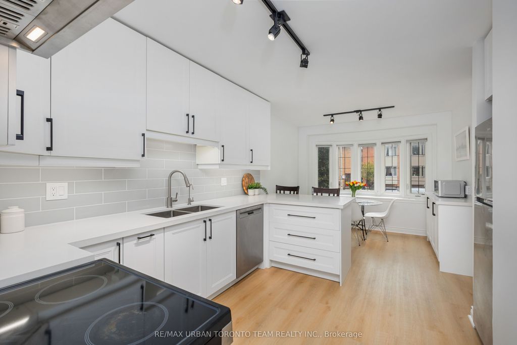 Photo of 50 Ashland Avenue, Toronto, ON M4L 1K1 (MLS # E12427448)