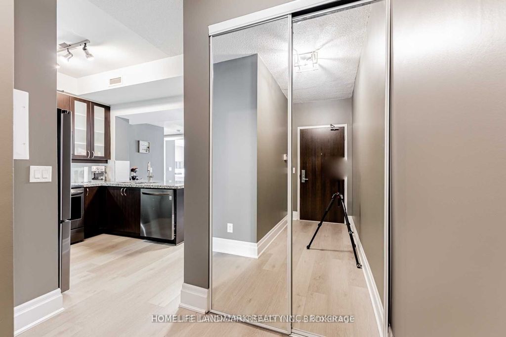 Photo of 57 Upper Duke Crescent #205, Markham, ON L6G 0B7 (MLS # N12650782)