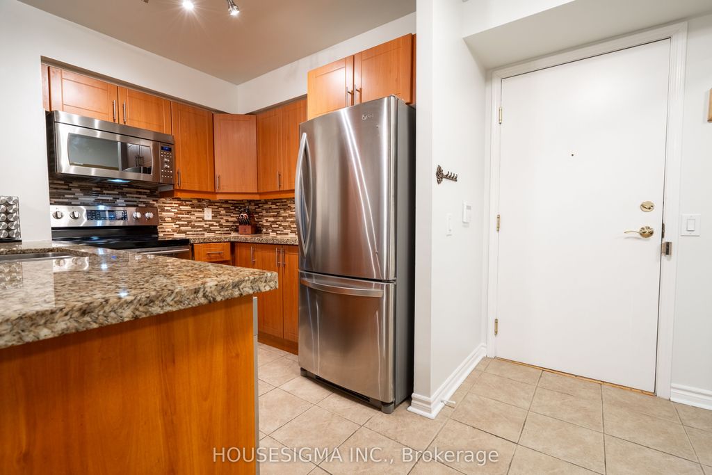 Photo of 35 Kingsbridge Garden Circle #513, Mississauga, ON L5R 3Z5 (MLS # W13131262)