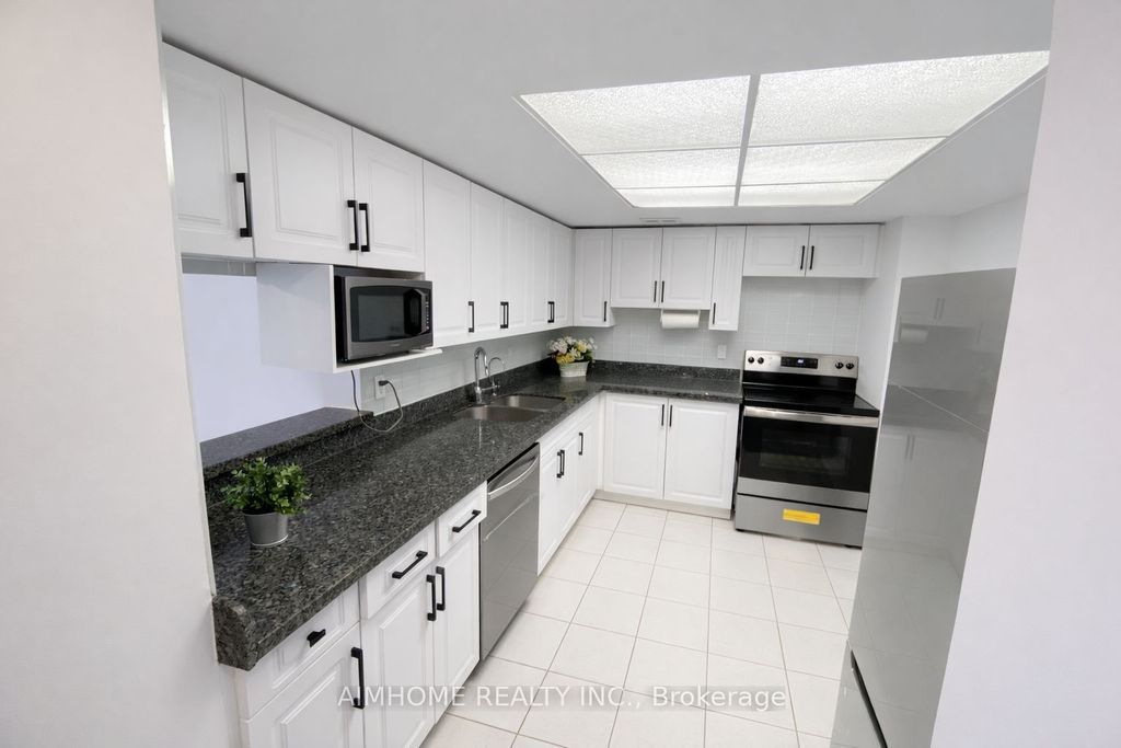 Photo of 275 Bamburgh Circle #201, Toronto, ON M1W 3X4 (MLS # E13015336)