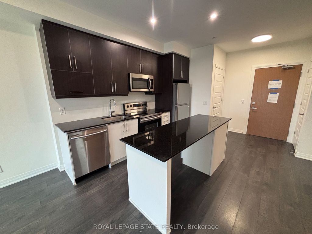 Photo of 128 Grovewood Common #417, Oakville, ON L9H 0X3 (MLS # W13049220)