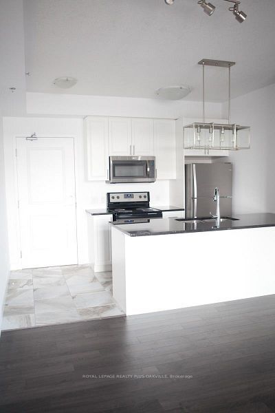 Photo of 2490 Old Bronte Road #221, Oakville, ON L6M 0Y5 (MLS # W13841992)