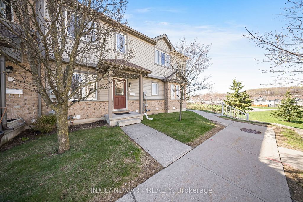 Photo of 535 Windflower Crescent #18, Kitchener, ON N2E 4L7 (MLS # X13041100)