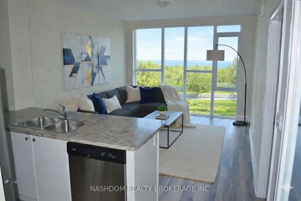 Photo of 16 Concord Place #516, Grimsby, ON L3M 0J1 (MLS # X13603384)