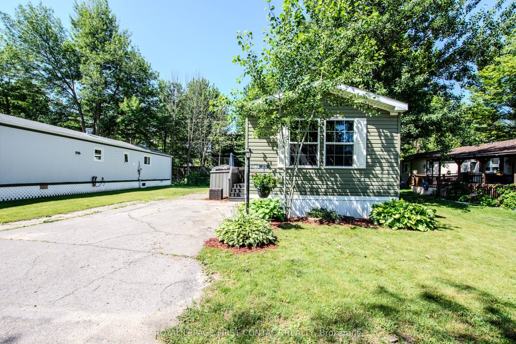 Photo of 23 Georgian Glen Drive, Wasaga Beach, ON L9Z 1K8 (MLS # S13555682)
