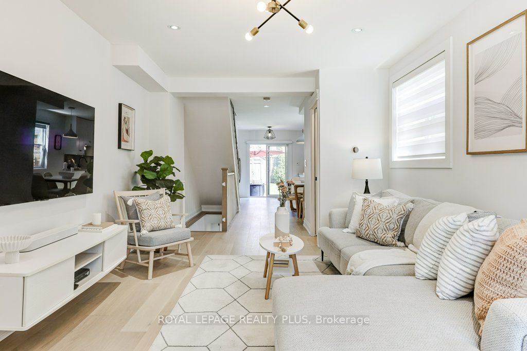 Photo of 55 Rhodes Avenue, Toronto, ON M4L 2Z8 (MLS # E13057220)