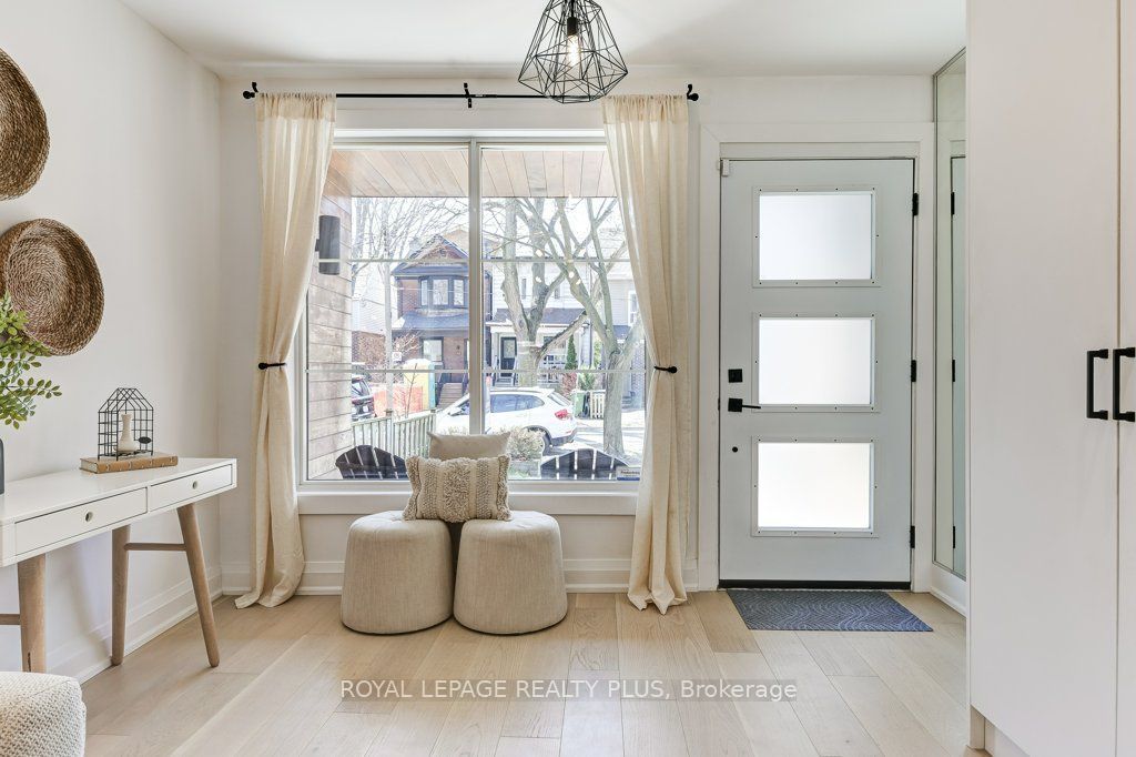 Photo of 55 Rhodes Avenue, Toronto, ON M4L 2Z8 (MLS # E13057220)