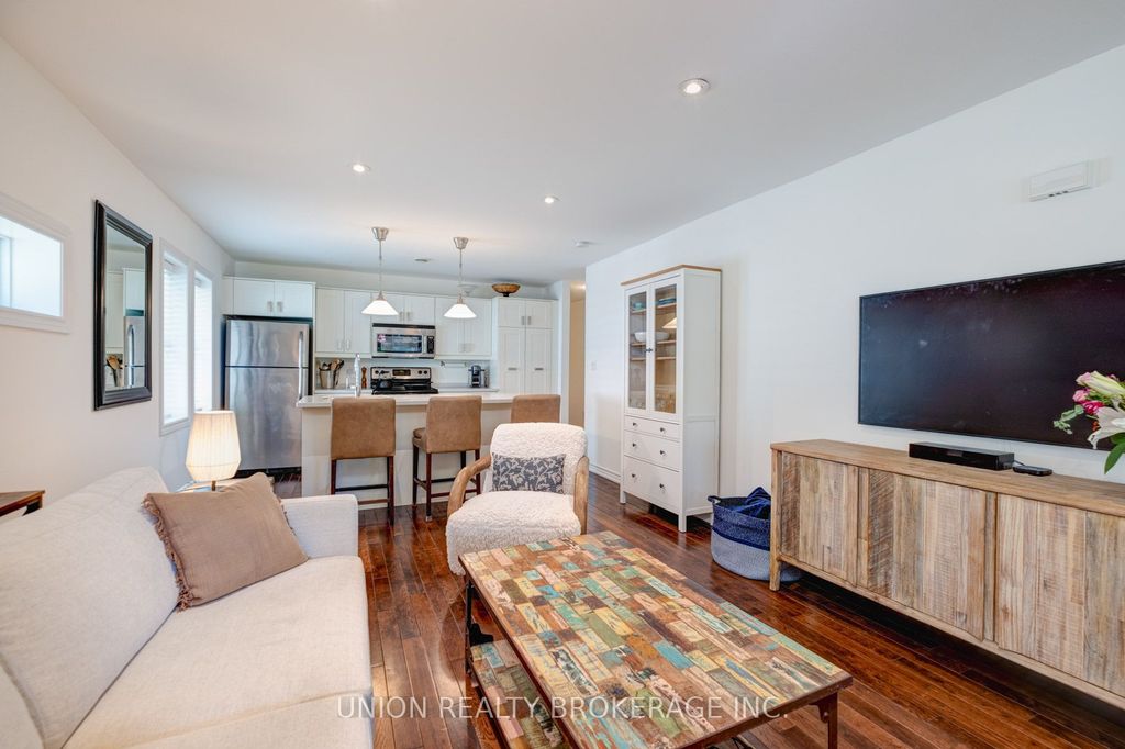 Photo of 11 Bonfield Avenue, Toronto, ON M4E 1B9 (MLS # E12247818)