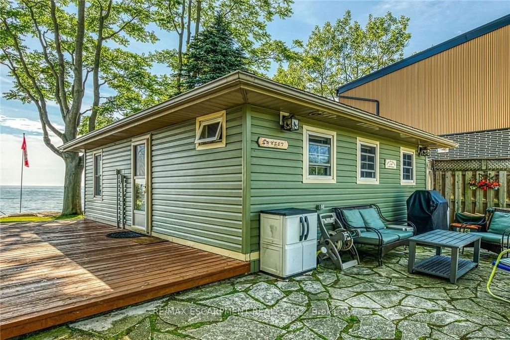 Photo of 803 Sandy Bay Road, Haldimand, ON N1A 2W6 (MLS # X13087430)