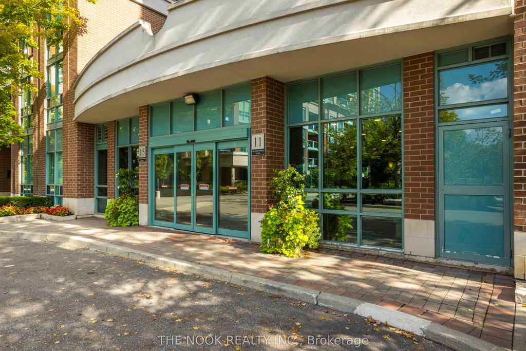 Photo of 11 Michael Power Place #303, Toronto, ON M9A 5G3 (MLS # W12448375)