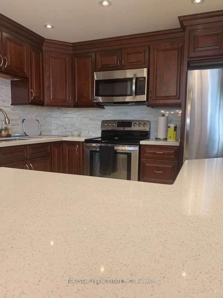 Photo of 500 Glencairn Avenue #303, Toronto, ON M6B 1Z1 (MLS # C13583956)