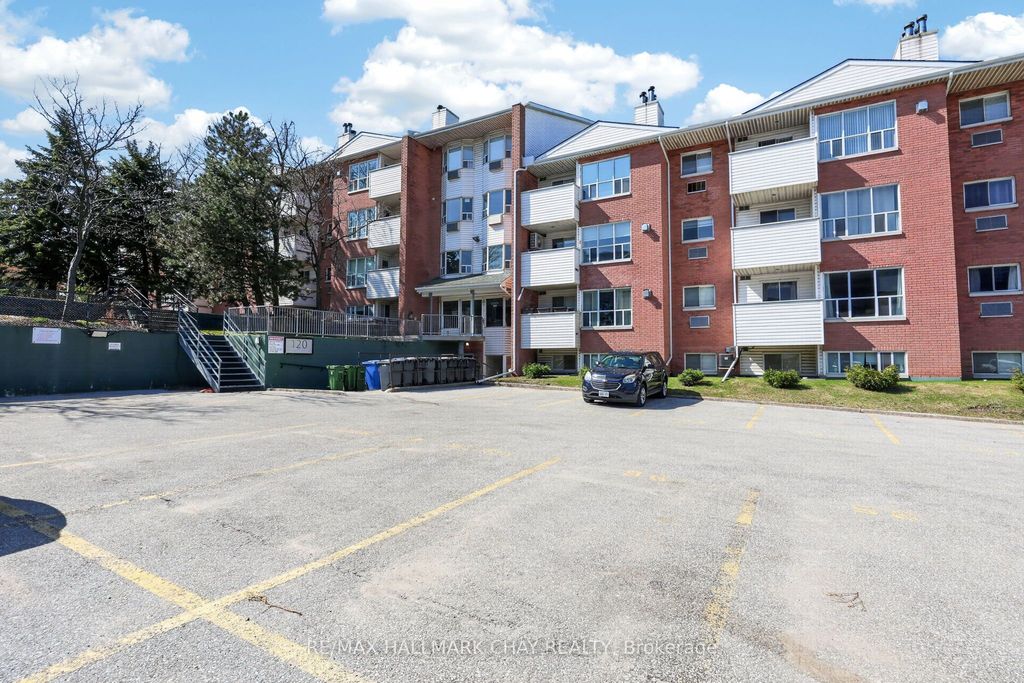 Photo of 120 Bell Farm Road #304, Barrie, ON L4M 6J2 (MLS # S13041016)