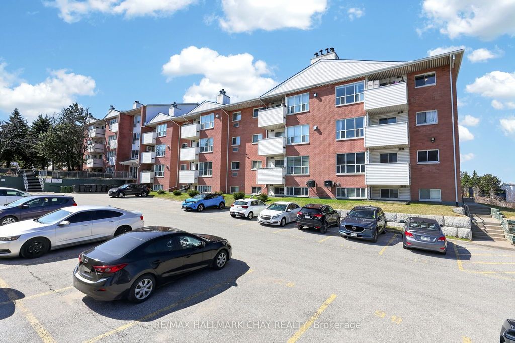 Photo of 120 Bell Farm Road #304, Barrie, ON L4M 6J2 (MLS # S13041016)