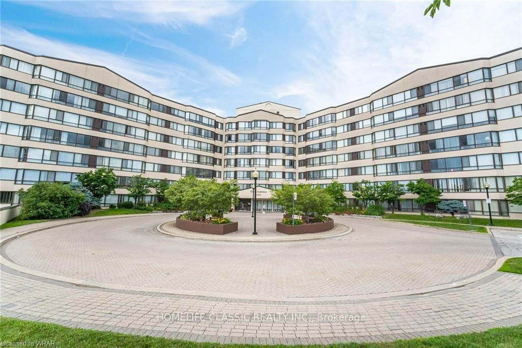 Photo of 1001 Cedarglen Gate #617, Mississauga, ON L5C 4R2 (MLS # W13859428)