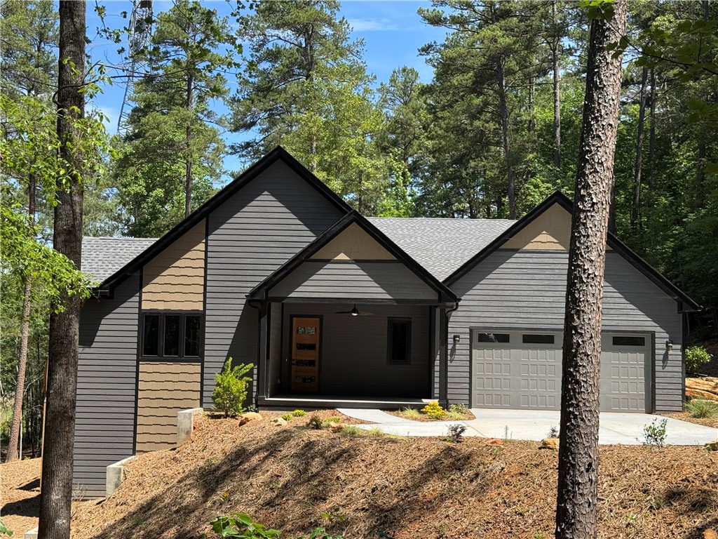 This modern home features a spacious deck, ideal f