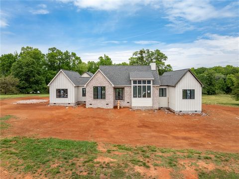 Photo of 778 Garrison Road, Pelzer, SC 29669 (MLS # 20301139)