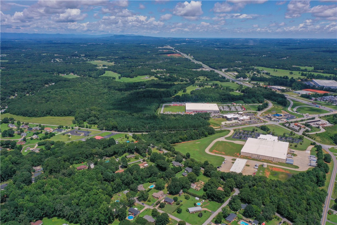 Expansive aerial views reveal lush landscapes and