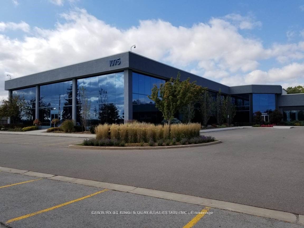 1075 North Service Road W 201