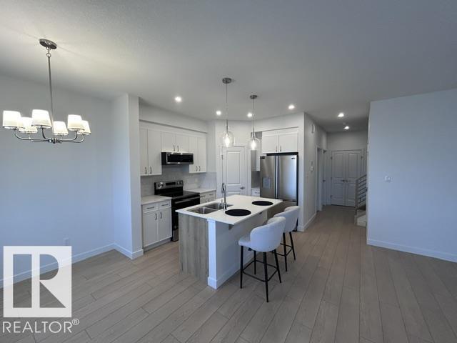 20936 16 AV NW