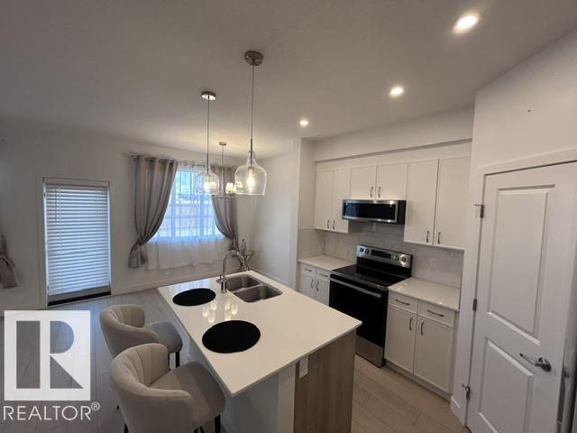 20936 16 AV NW