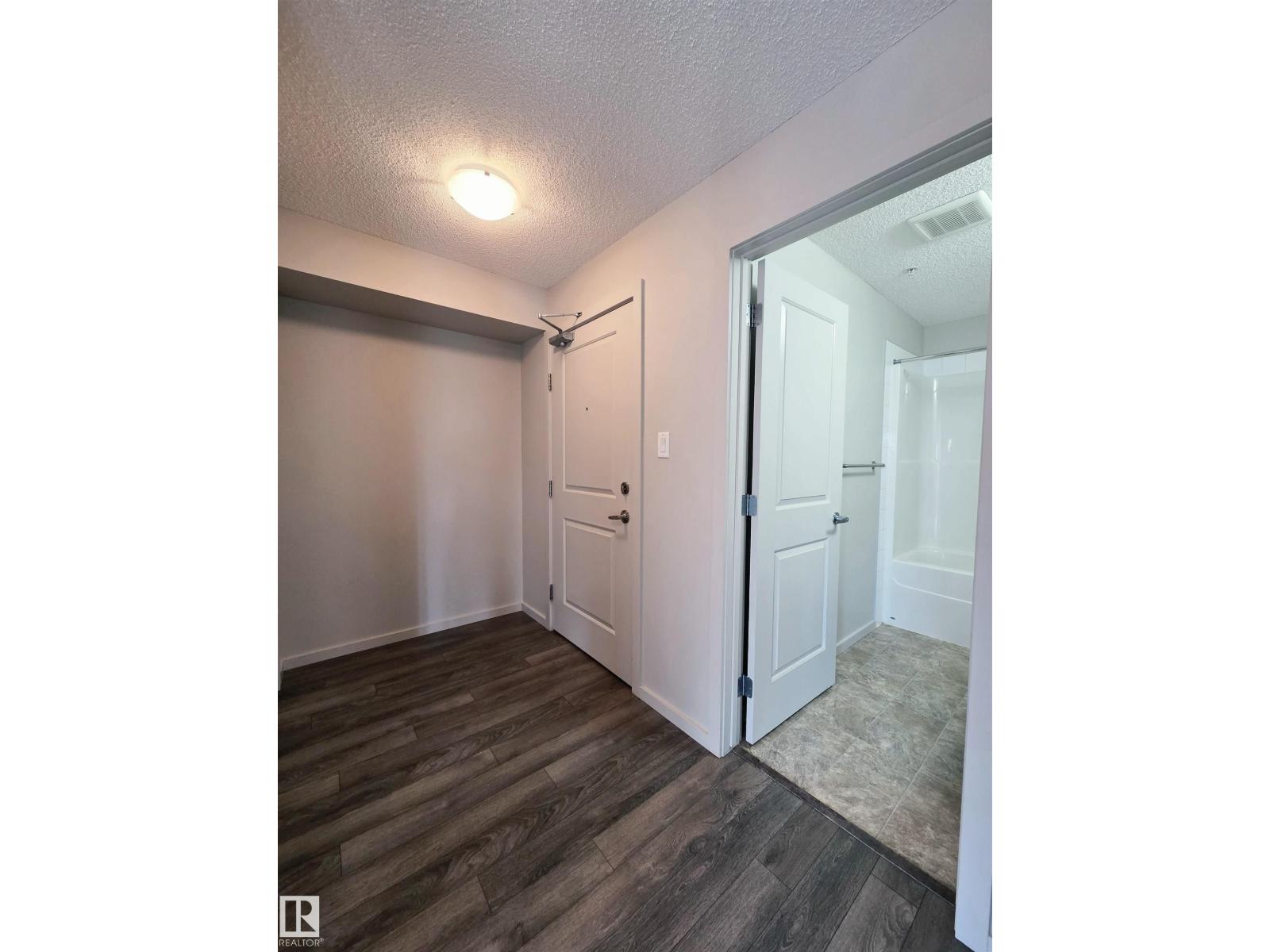#222 390 WINDERMERE RD NW