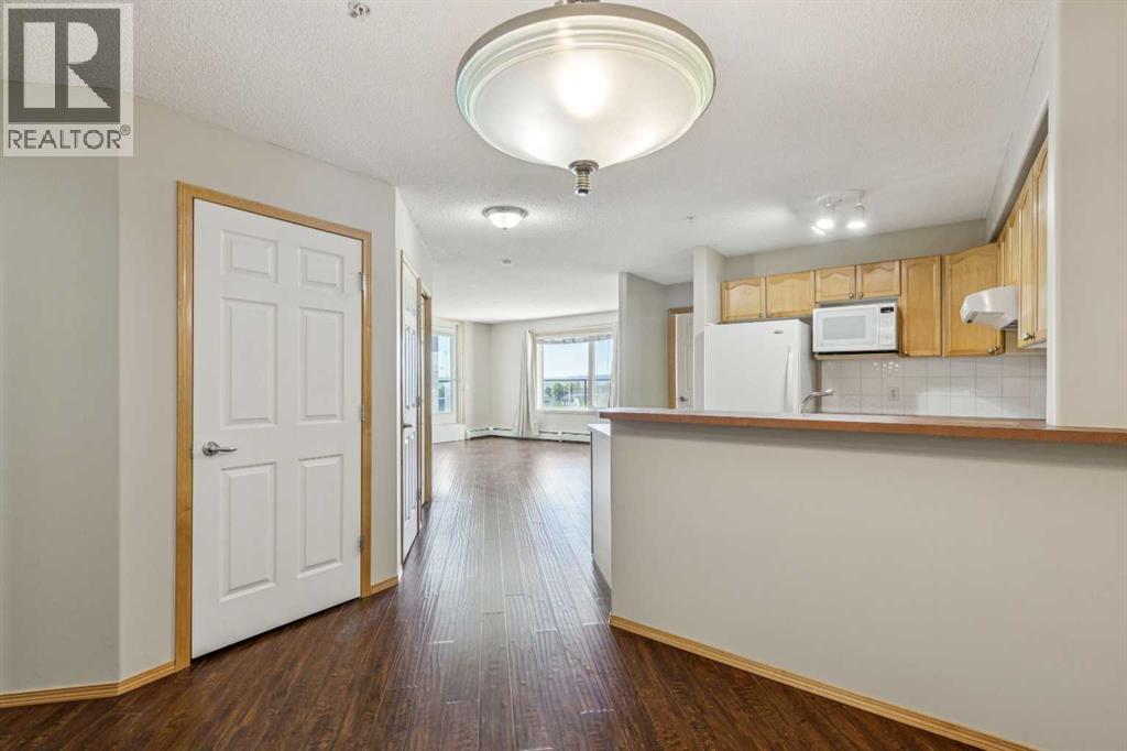 1107, 950 Arbour Lake Road NW
