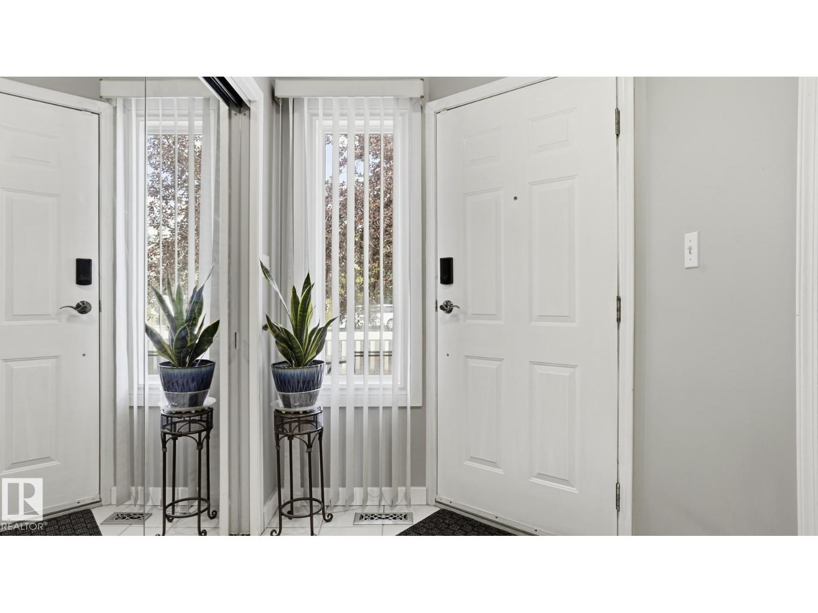 11249 12 AV NW