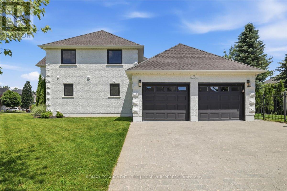 521 FALCONRIDGE CRESCENT