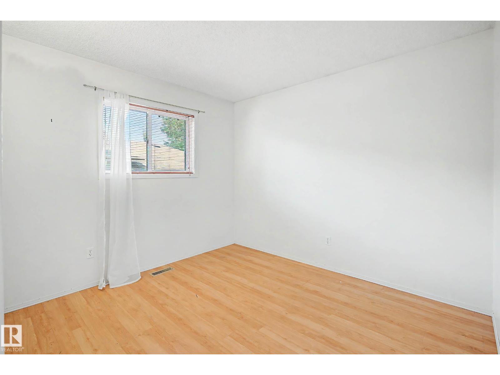 18411 77 AV NW