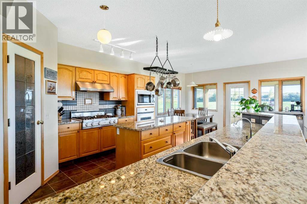 386109 128 Street W