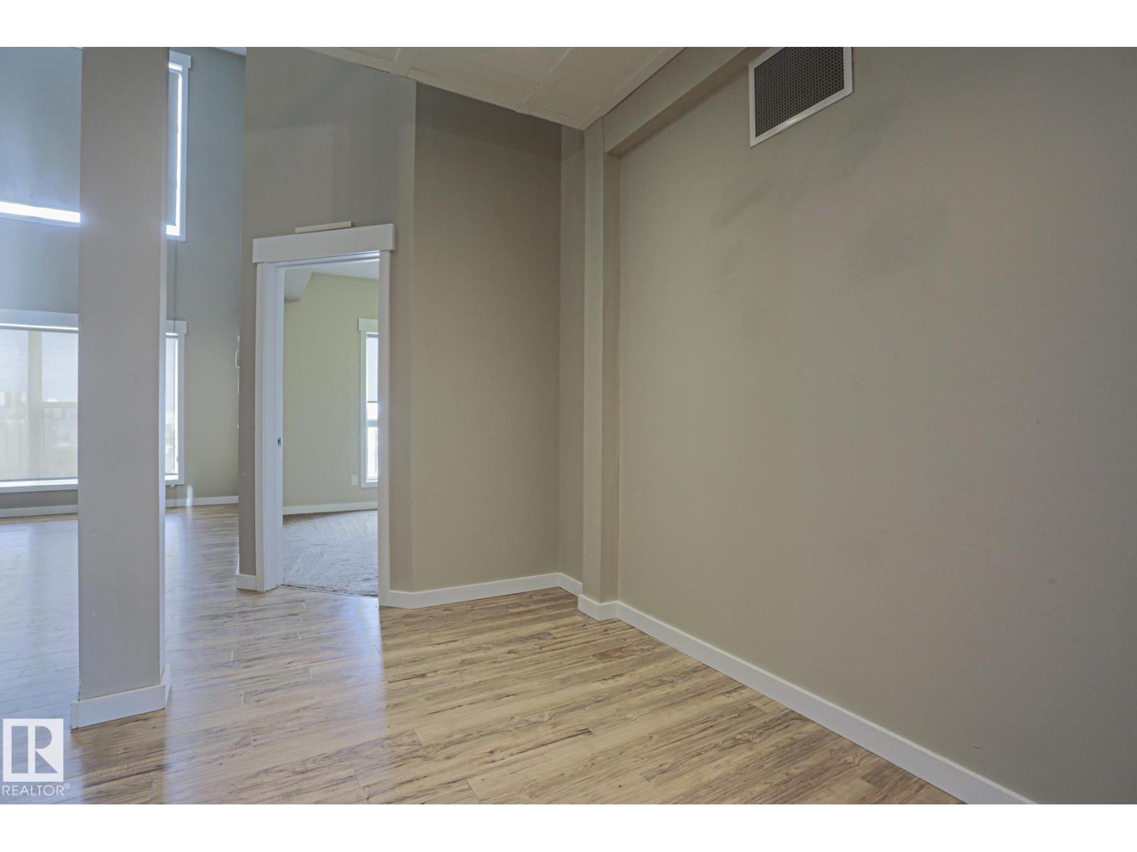 #607 10518 113 ST NW NW