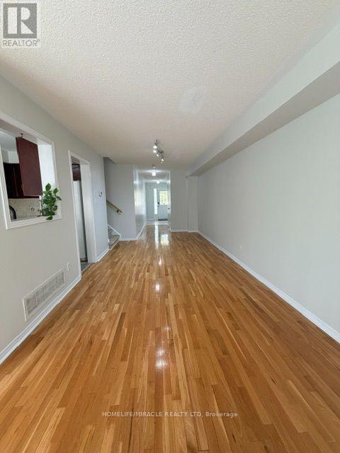 7 - 6391 SPINNAKER CIRCLE