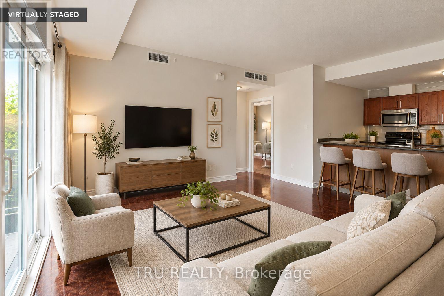 7 - 165 WATERBRIDGE DRIVE
